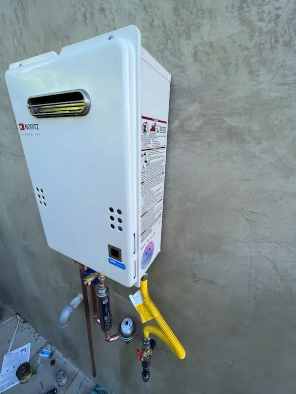 Tankless water heater installation for Pine Log homes